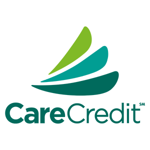 CareCredit logo with curved leaf design elements and text for dental financing services.